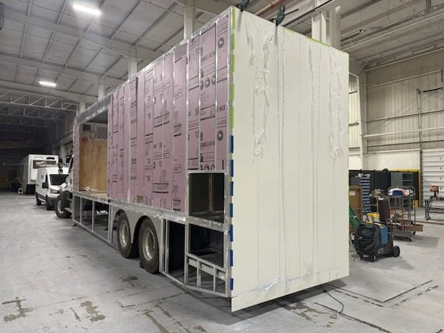 Lead-lined radiation shielding panels installed in imaging bay