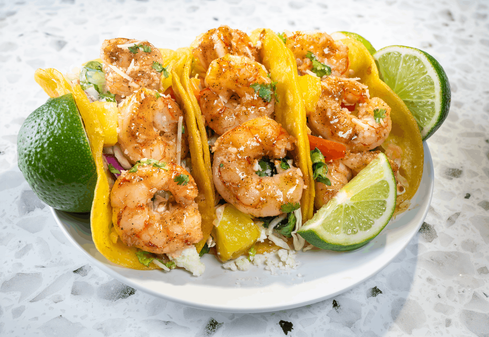 Tropical shrimp tacos prepared with Merman's Revenge