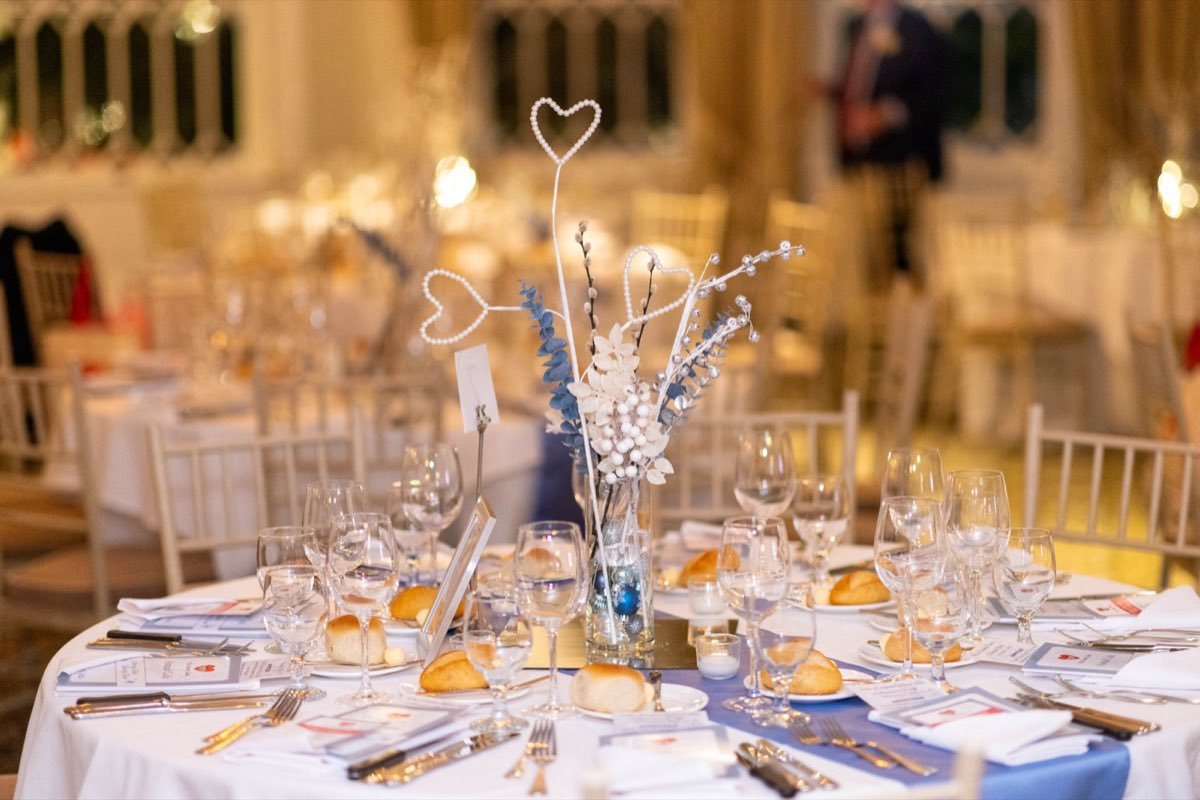 Elegant gala tablescape photographed before guests arrive