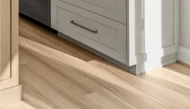 Consistent flooring installed throughout a remodeled home