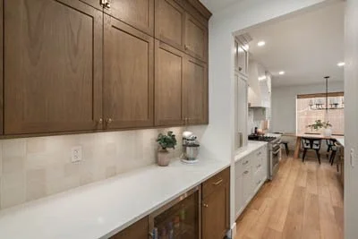 Custom kitchen cabinetry with inset doors and quartz countertops in Bellevue WA remodel