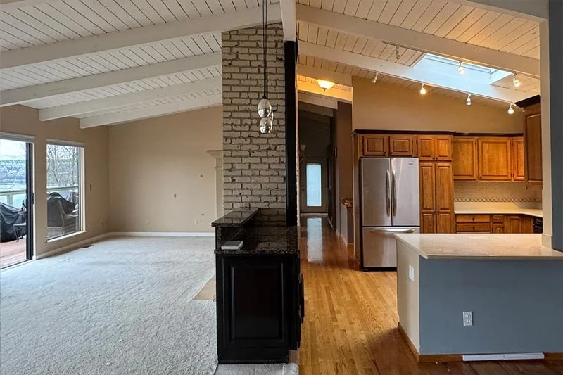 Disconnected kitchen and living spaces before an Auburn area main-floor remodel