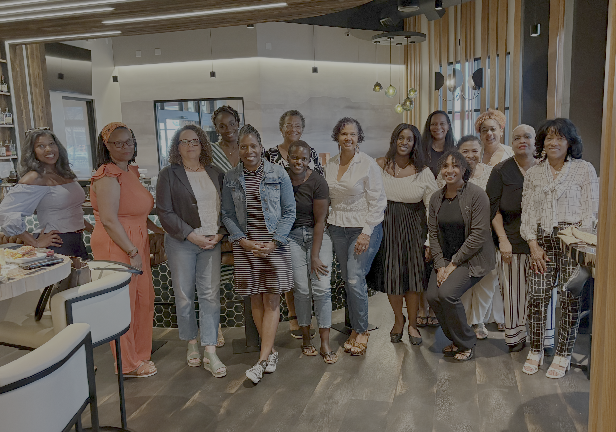Group photo of Sistas Who Lunch attendees at Hemlock inside The Inn at 500 Capitol, Boise