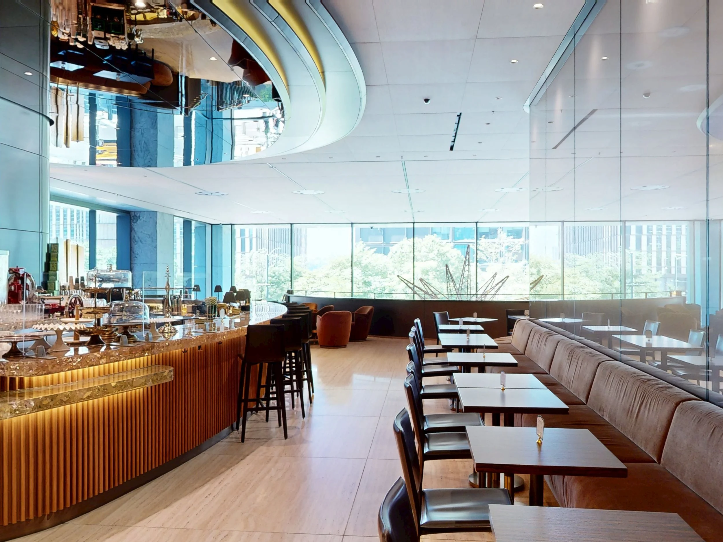 Bar Torino bar seating area with curved bar