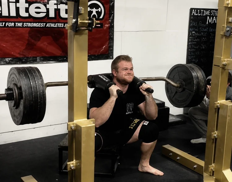 Paxton Titus performing a barbell squat