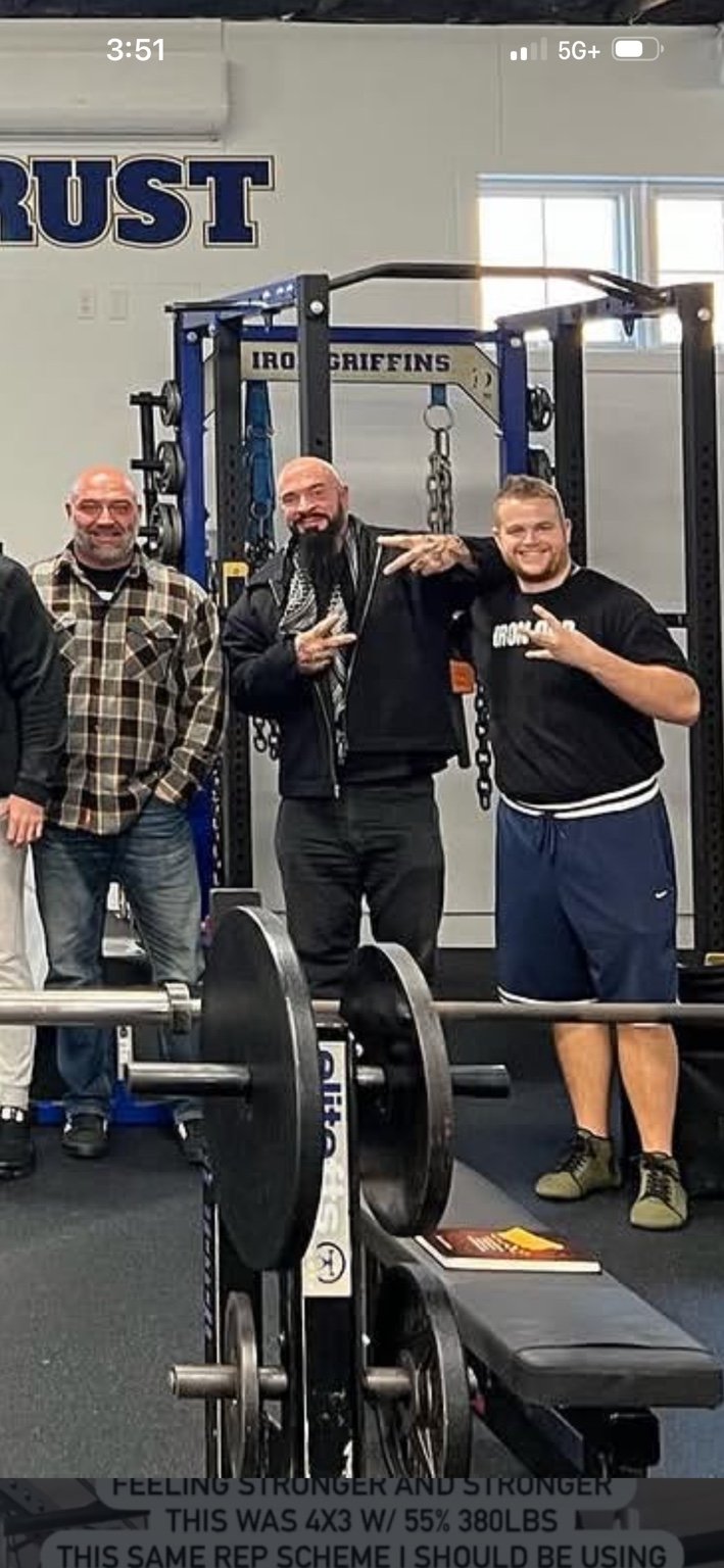 Paxton with strength training colleagues