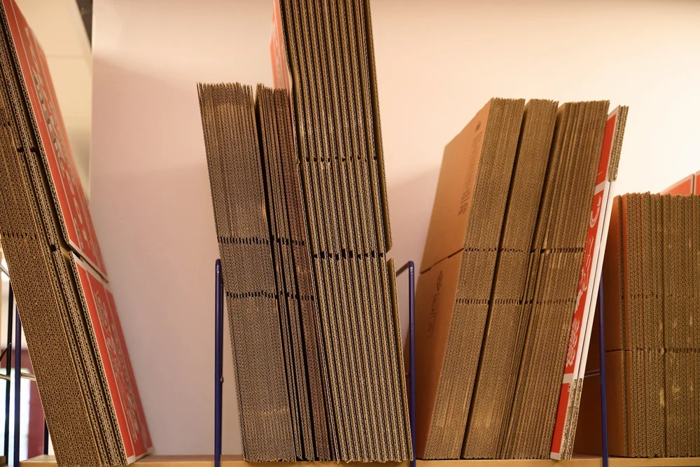 Flat-packed boxes ready for kit building at Scale 3PL