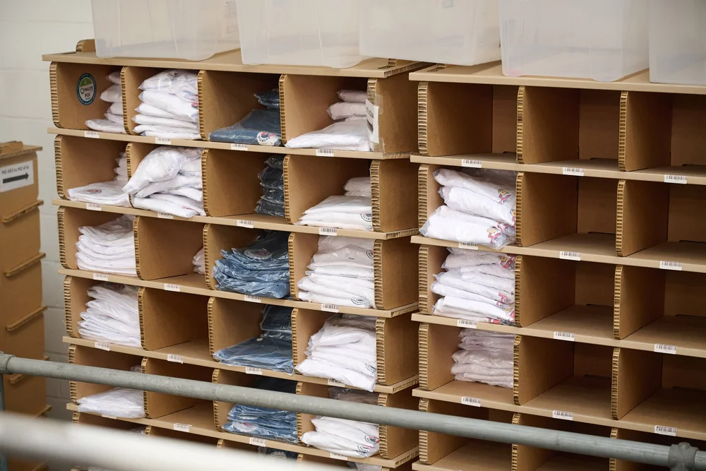Clothing stock stored in bins and shelving at Scale 3PL
