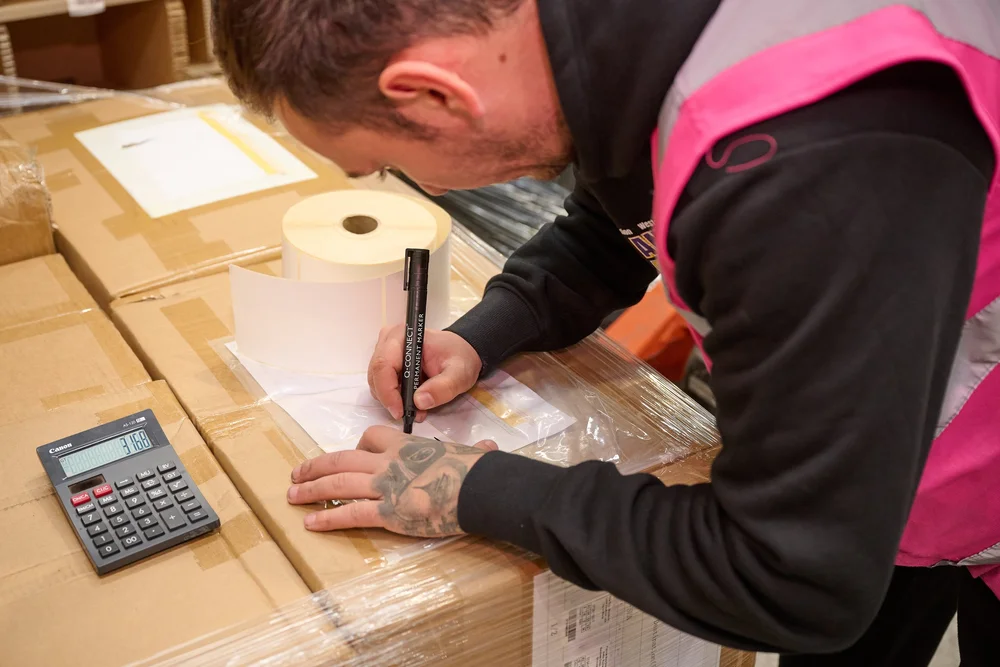 Checking a delivery against the paperwork at Scale 3PL goods in
