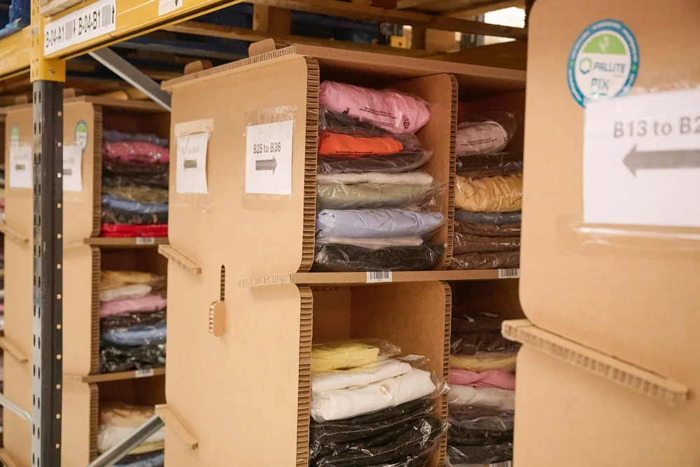 Clothing stock stored in bins and shelving at Scale 3PL