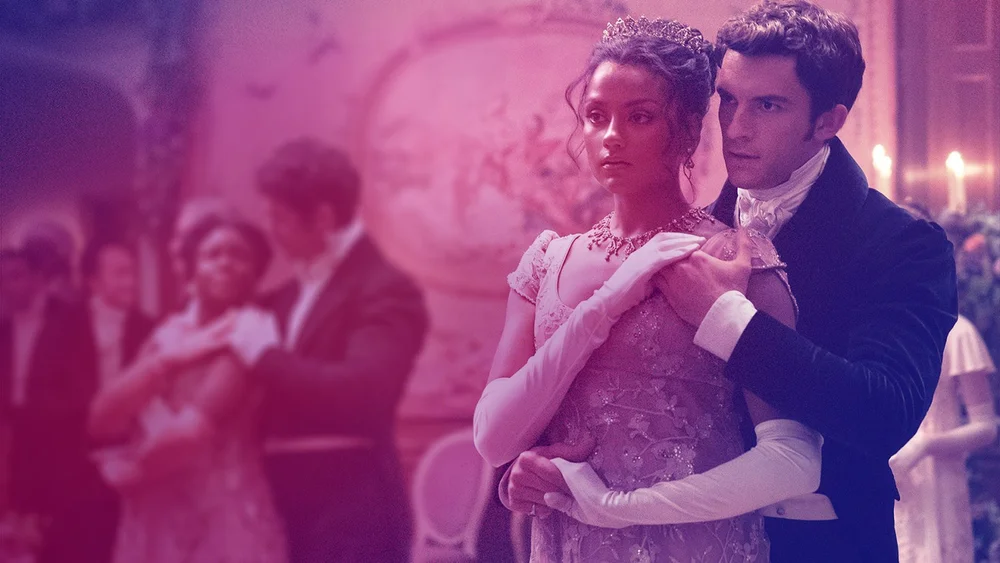 A Bridgerton couple dancing at a ball