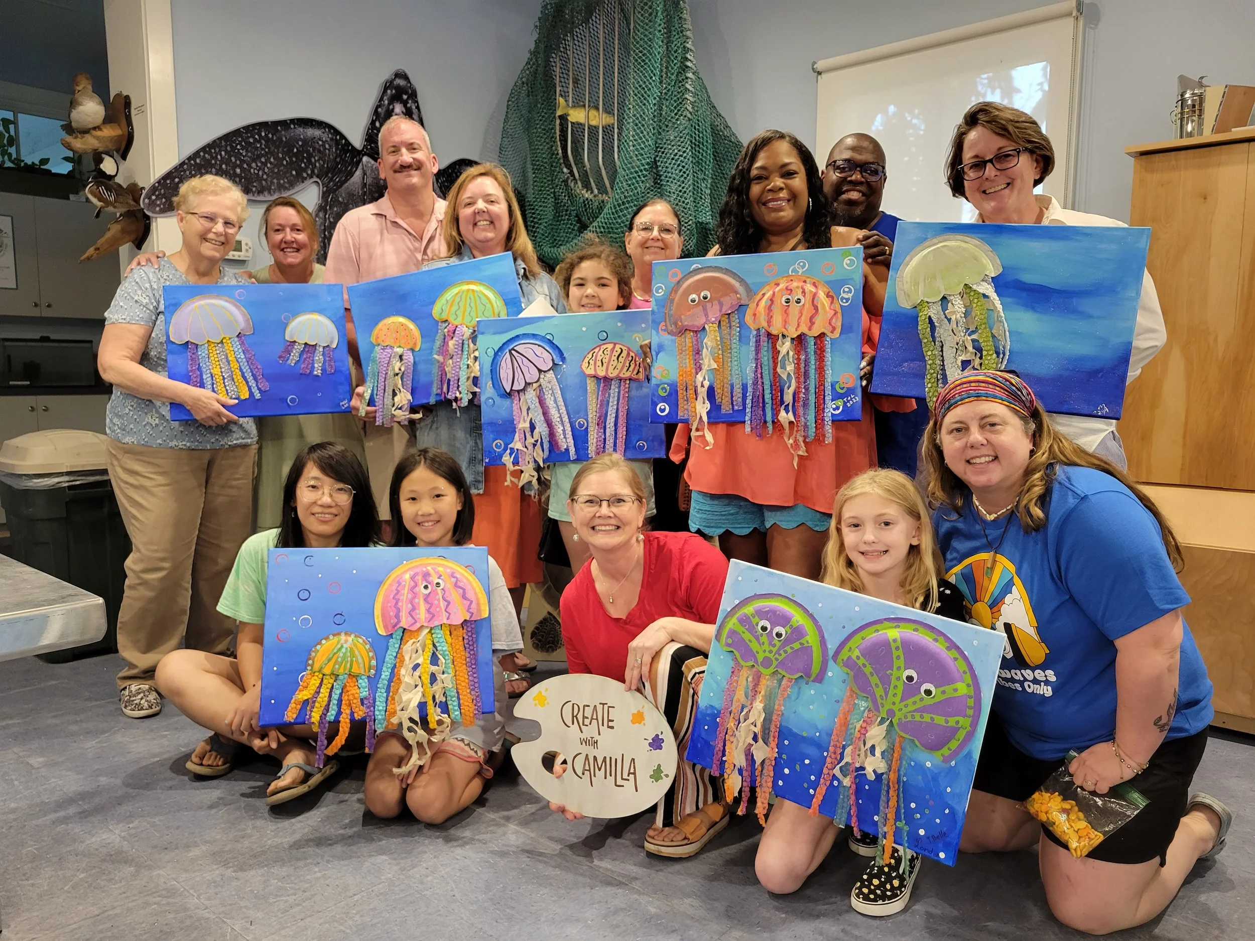 Guests enjoying a group painting experience