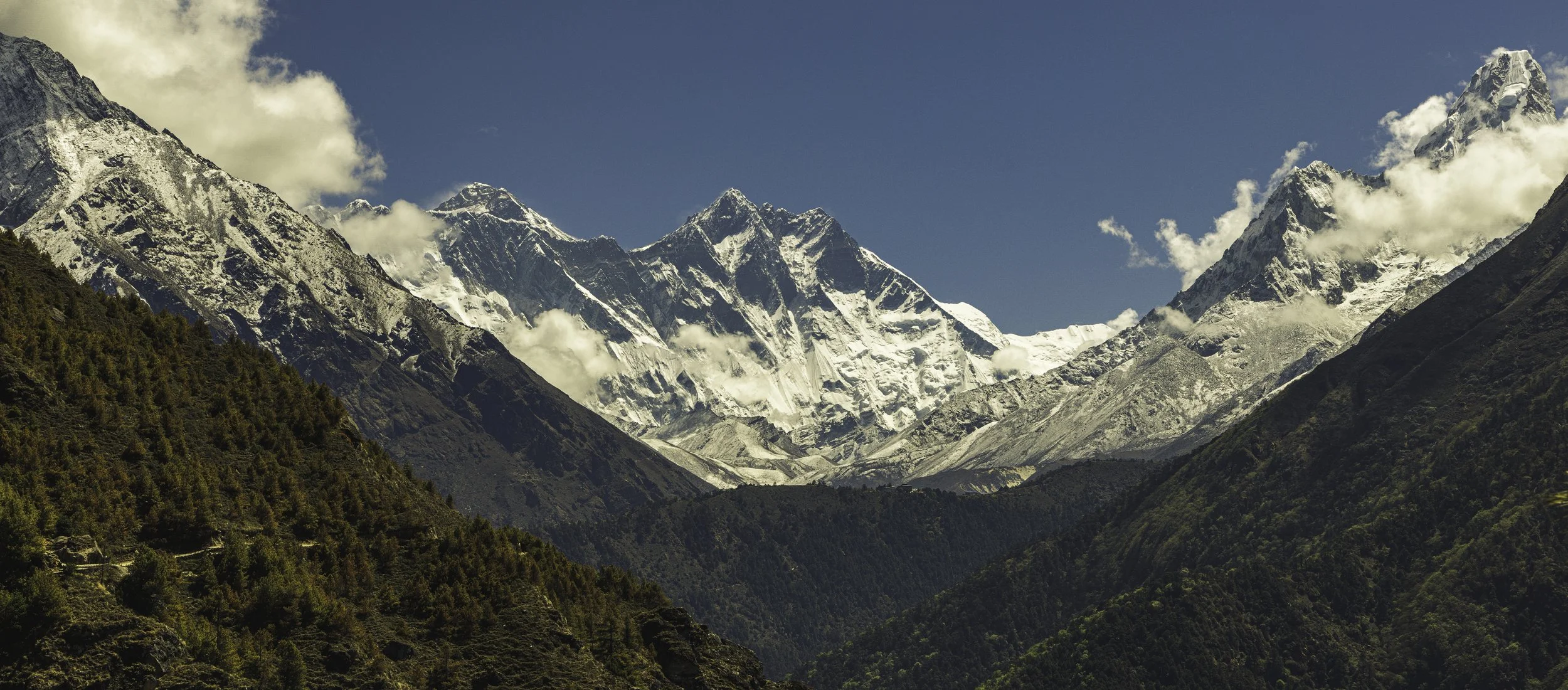 A panoramic Himalayan mountain valley