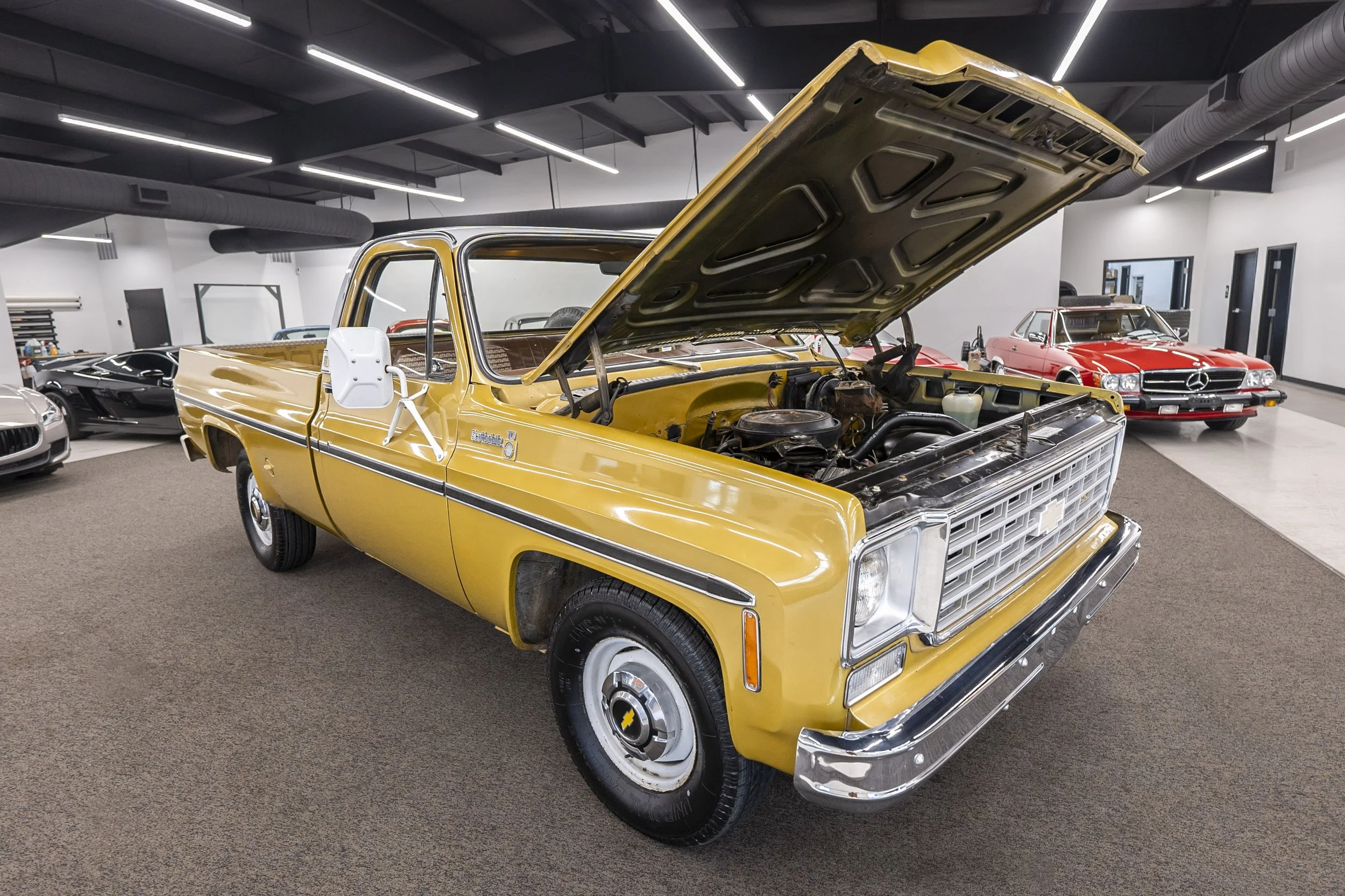 Chevrolet being serviced in the shop