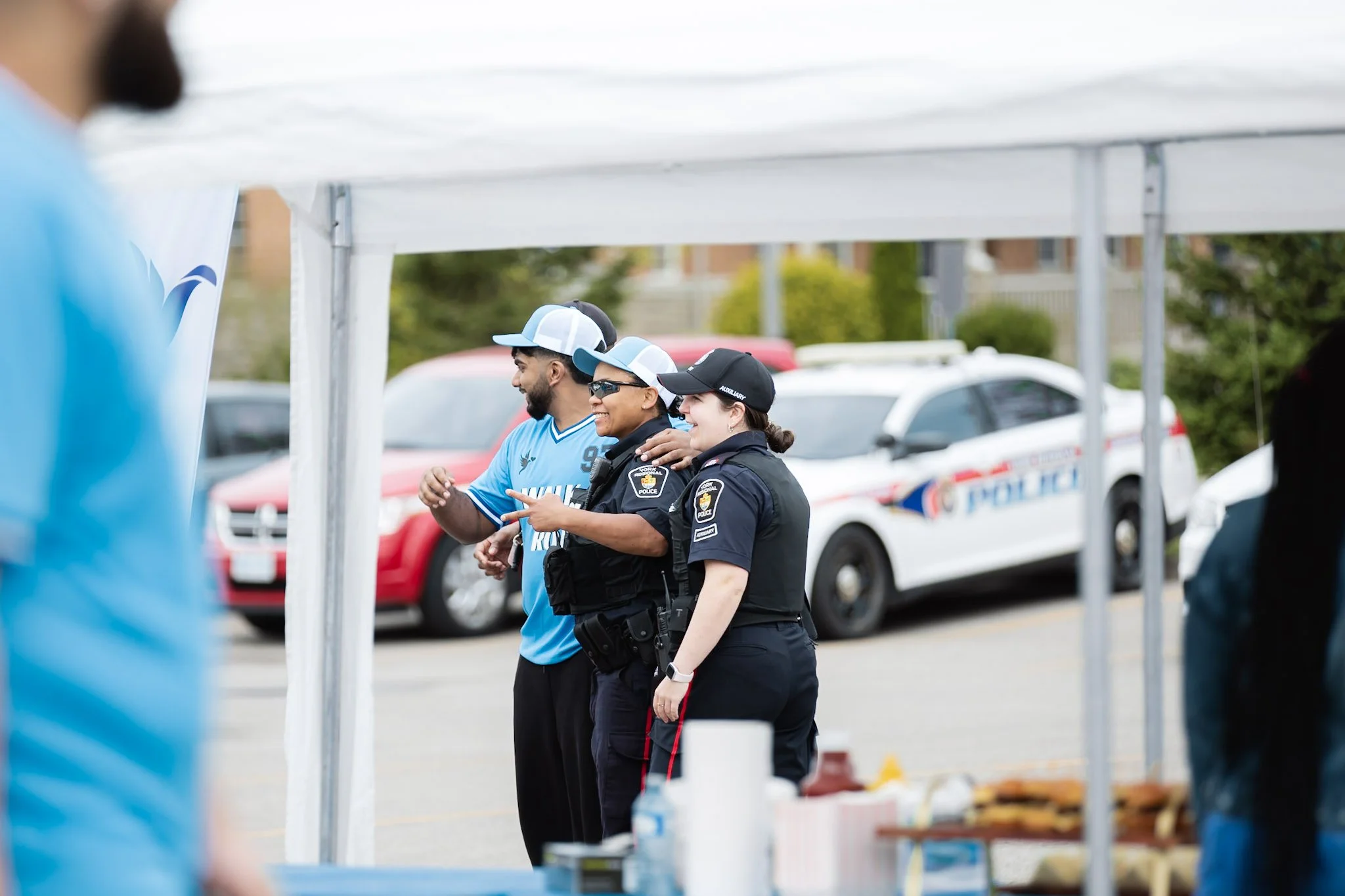 Police and volunteer chatting