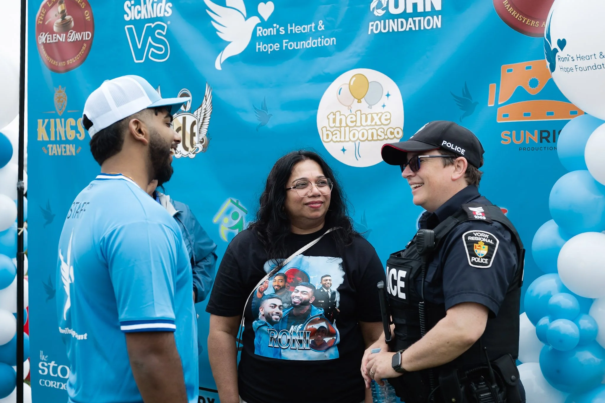 Food stand volunteer smiling