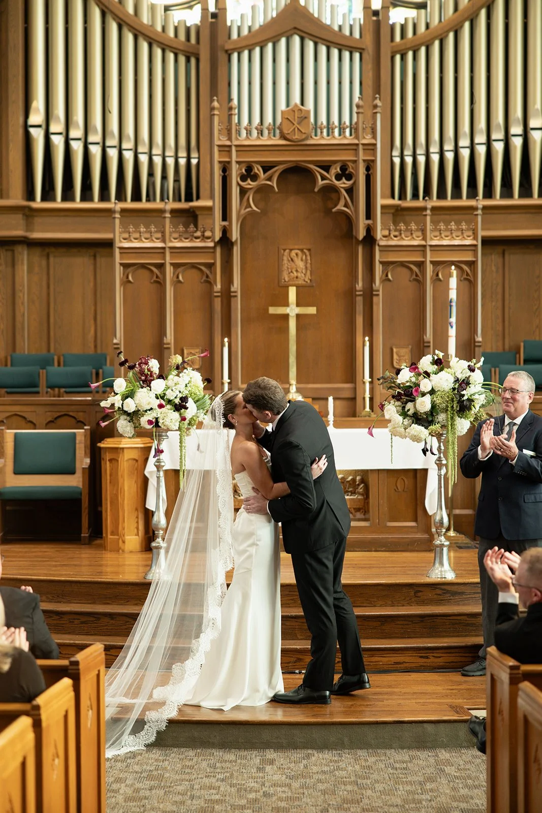 Ceremony arrangements on pedestals flanking the altar, florals by Hydrangea Bloom, photographed by Madisen Timp Weddings