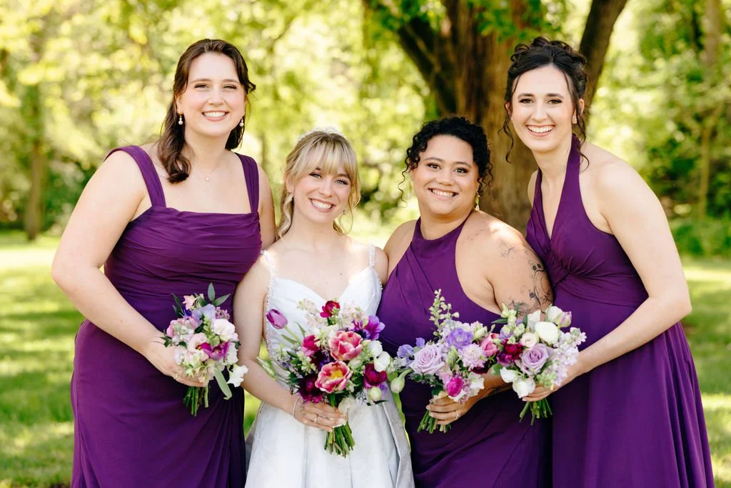 Bride with bridesmaids and their bouquets, florals by Hydrangea Bloom, photographed by Christina Ney Photography