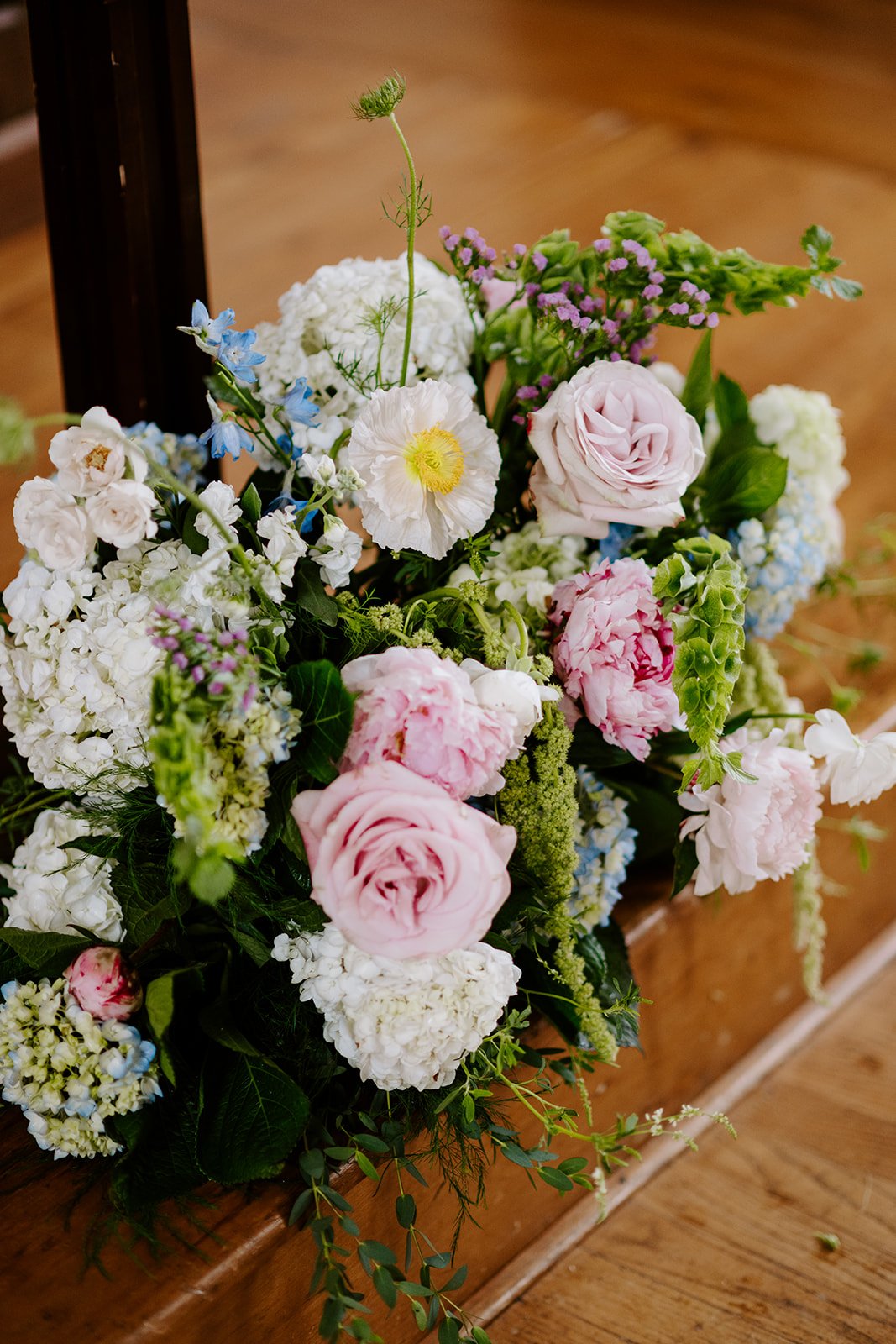 Ceremony arrangement in white and pink, florals by Hydrangea Bloom, photographed by Karly Ellis Photography