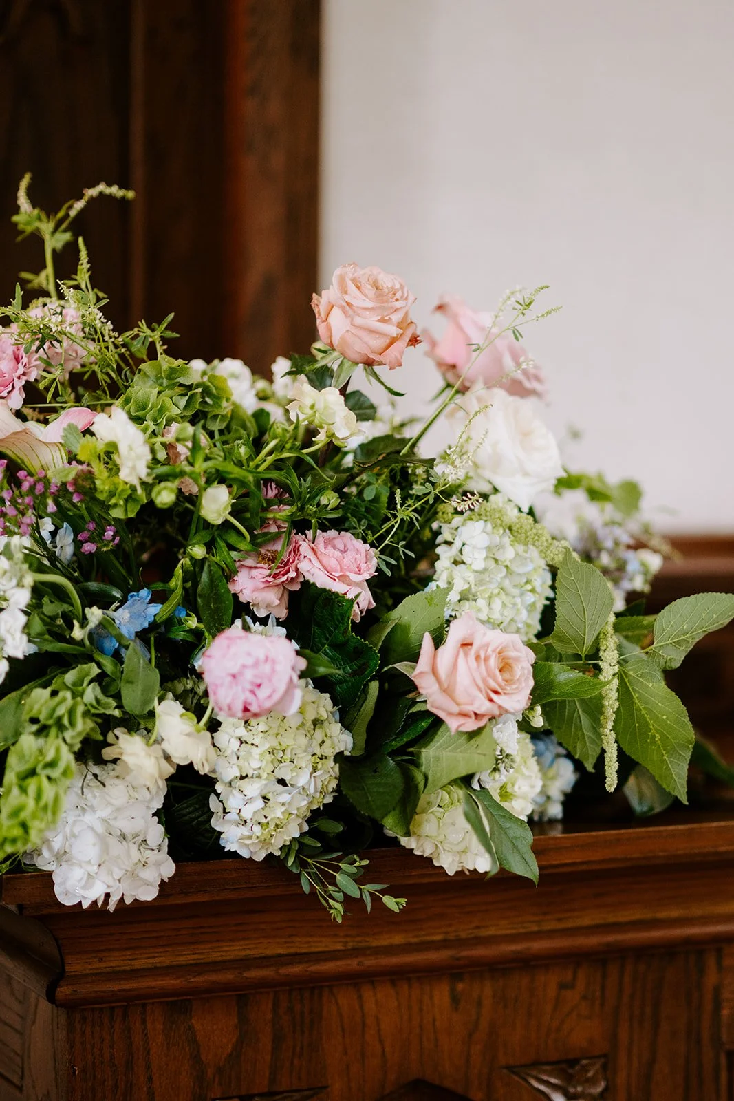 Chapel altar arrangement in blush and ivory, florals by Hydrangea Bloom, photographed by Karly Ellis Photography