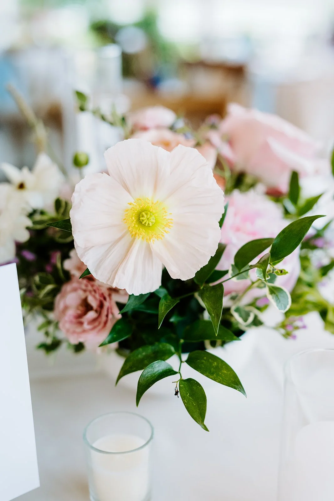 Low pink rose reception centerpiece, florals by Hydrangea Bloom, photographed by Karly Ellis Photography