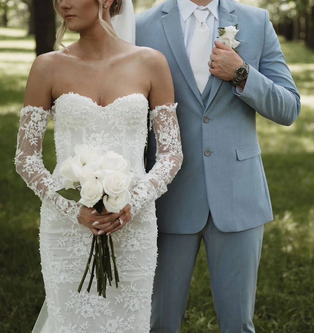 Couple together with the white bouquet, florals by Hydrangea Bloom, photographed by Shelby Sawyer Photography