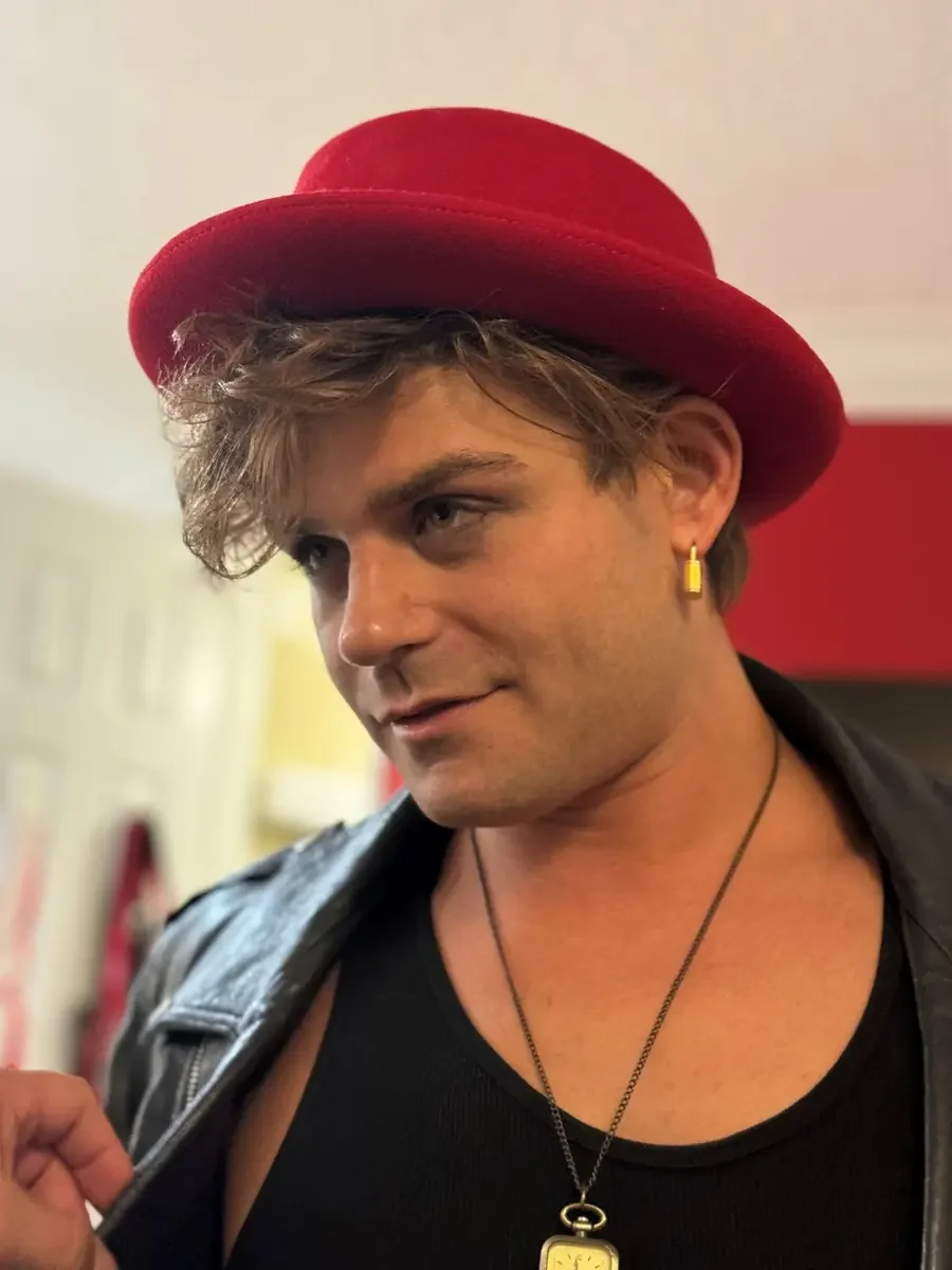 Cast member in costume between scenes