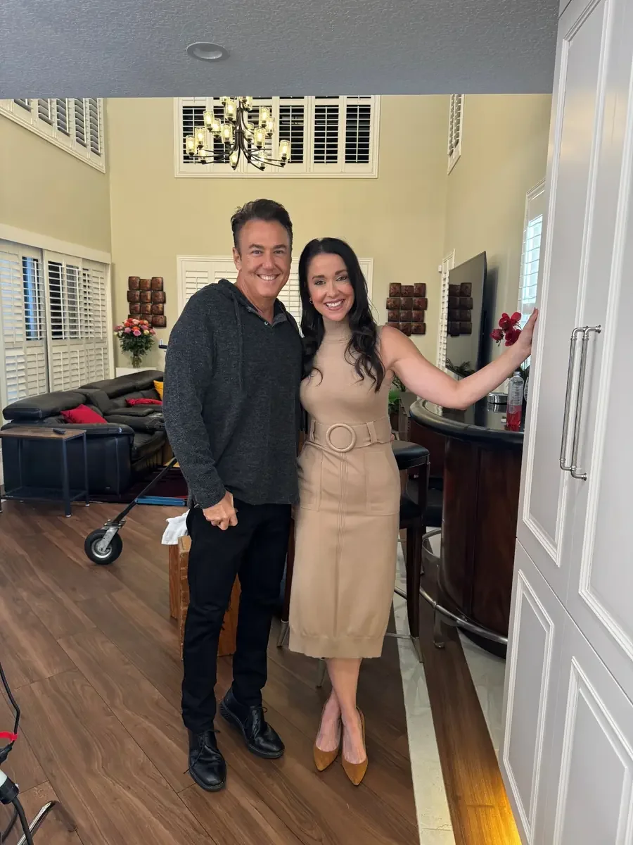 Director and cast member on set