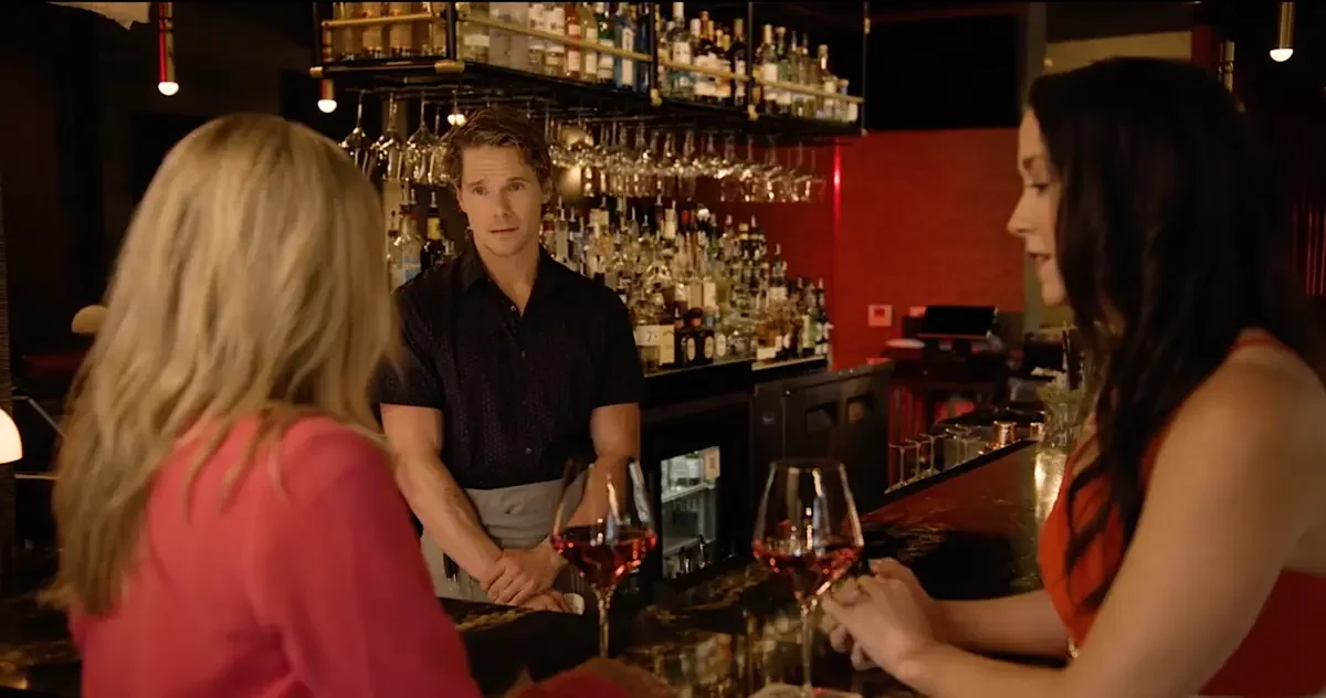 Cast members filming a bar scene