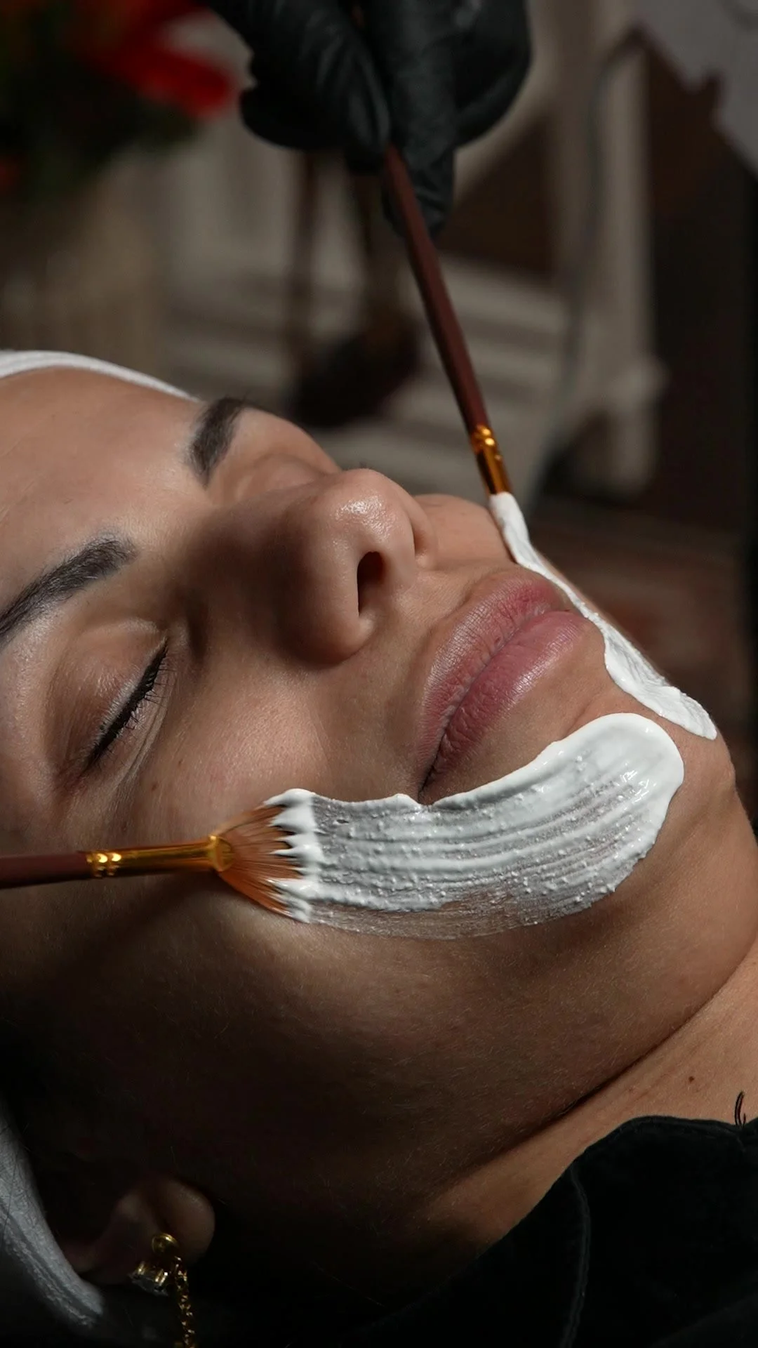 Facial mask being applied during a treatment