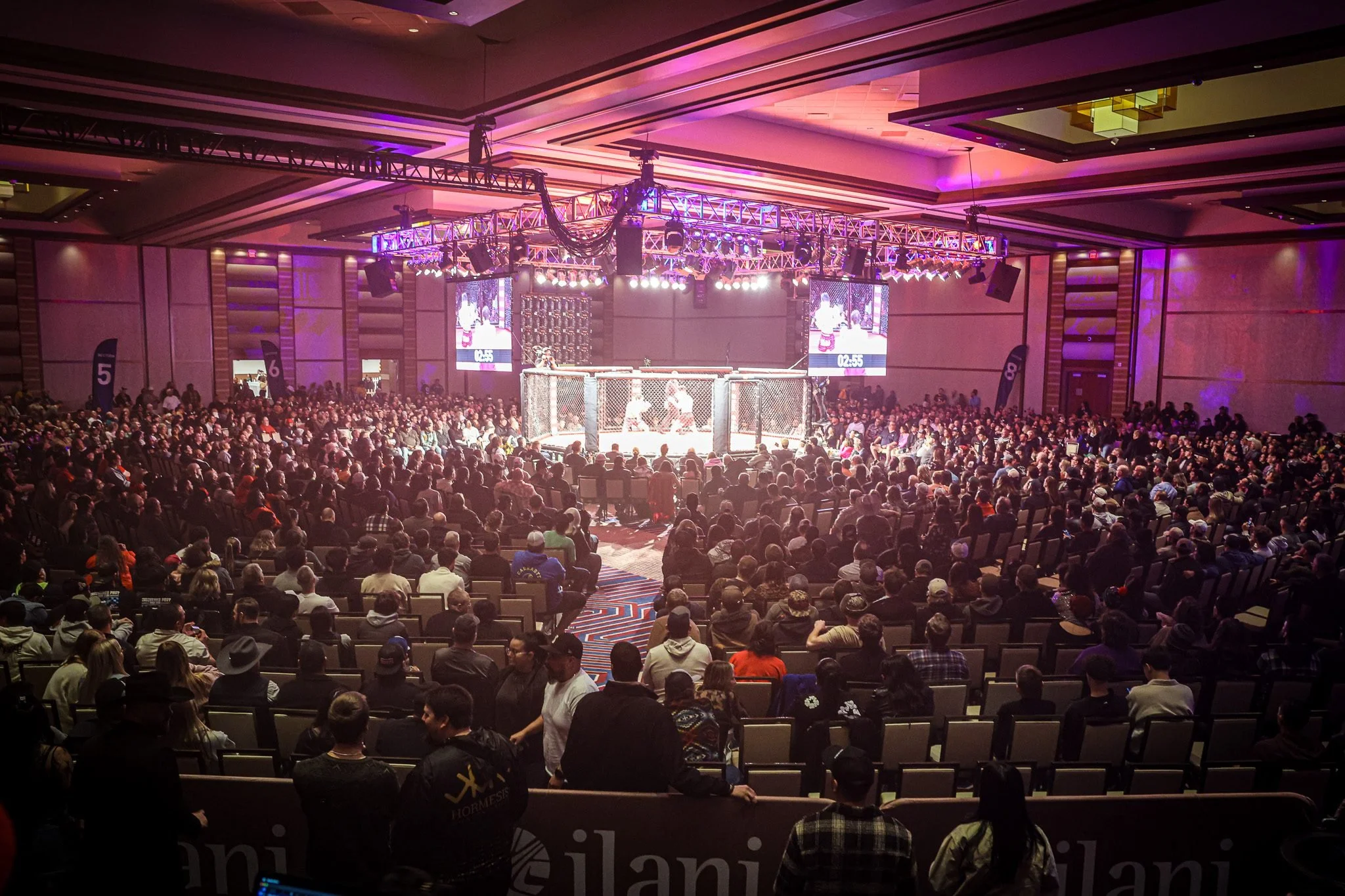 A full ballroom at ilani Casino Resort watching a WFC event