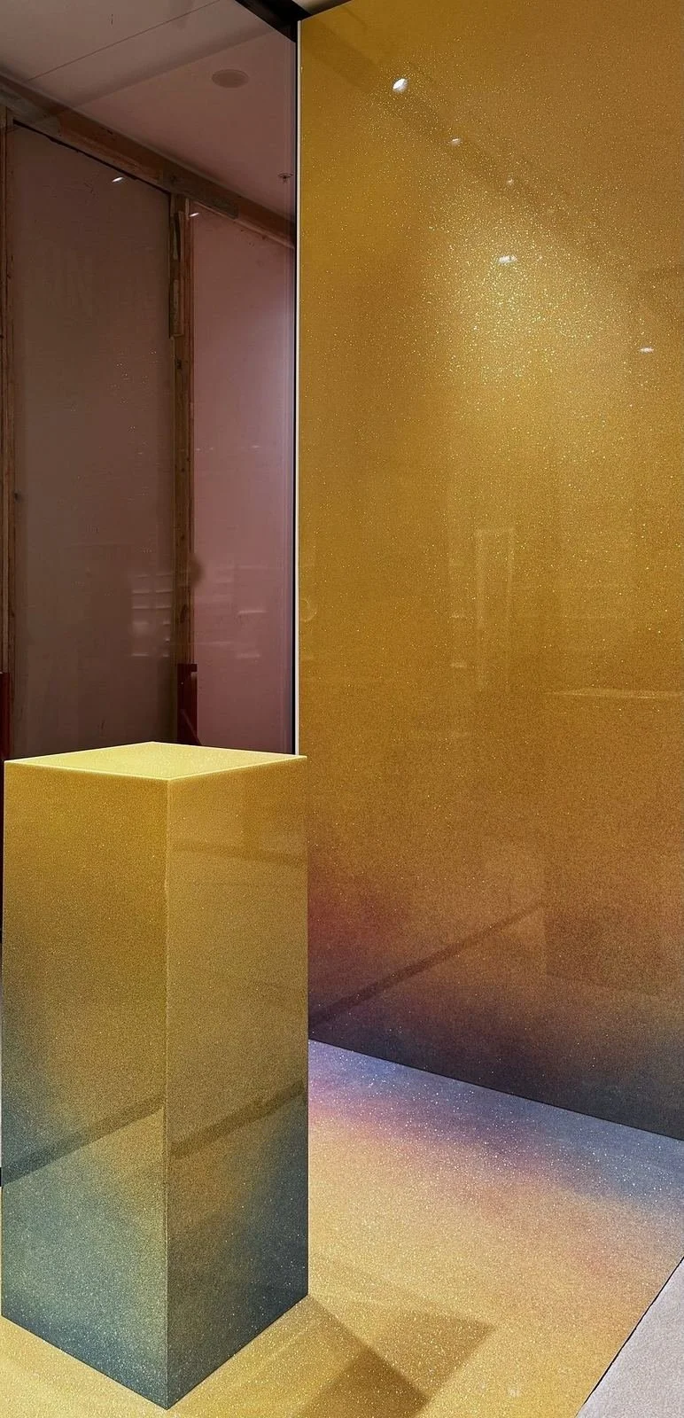 Display plinth beside the shopfront glazing