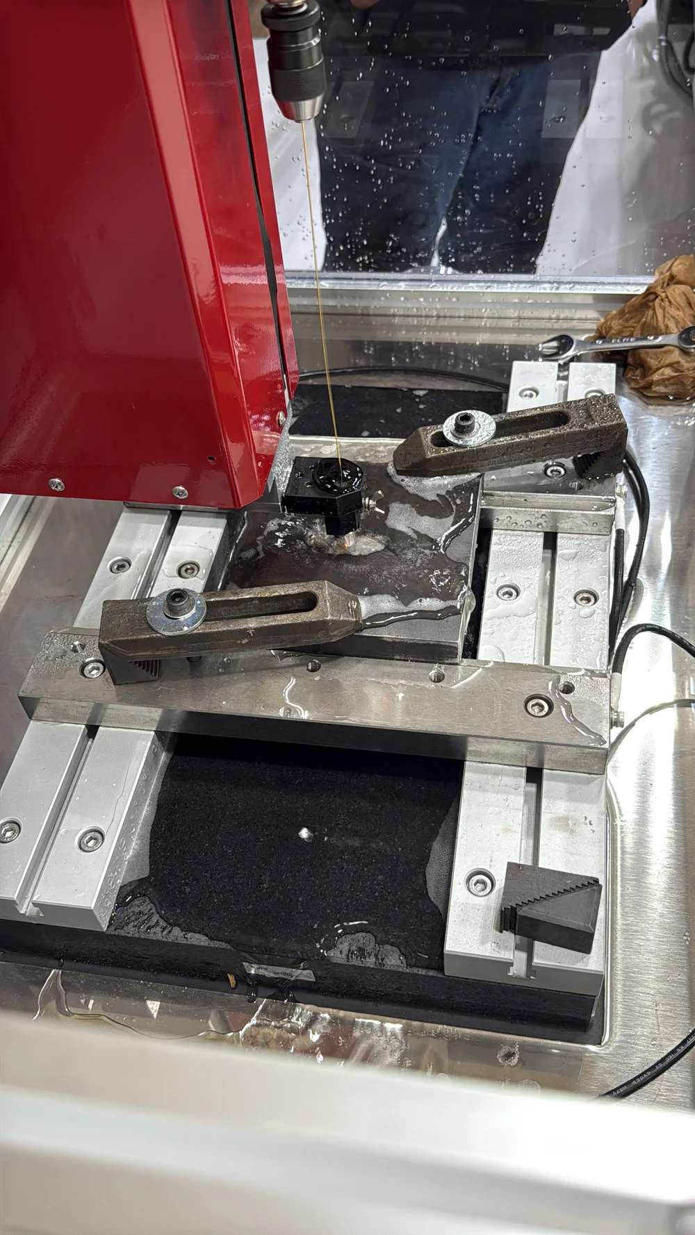 EDM hole drilling of small holes in a fixtured part at UTP Solutions
