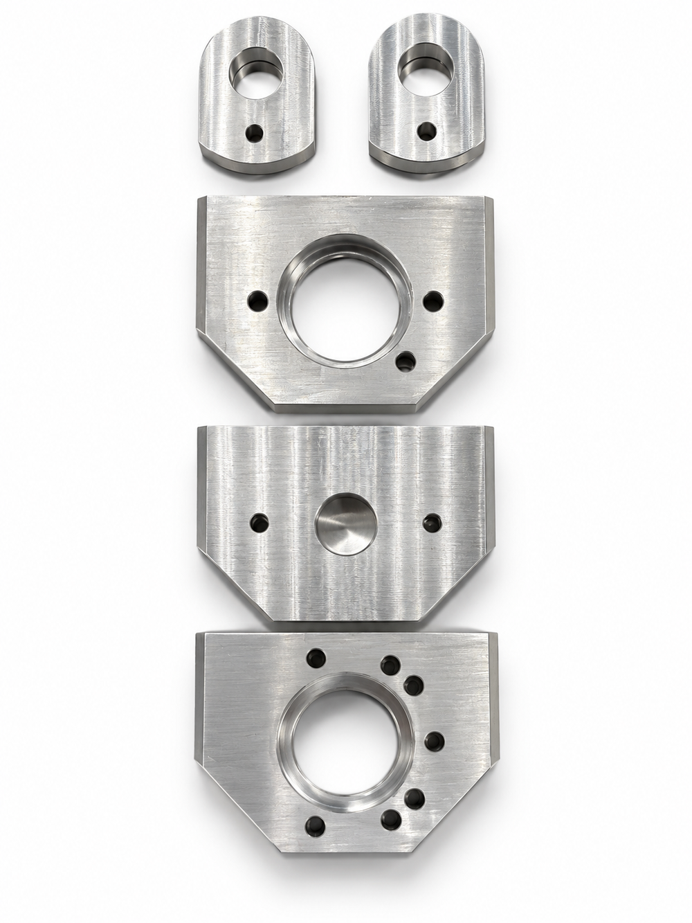 Precision-machined metal brackets for a surgical console system, made by UTP Solutions