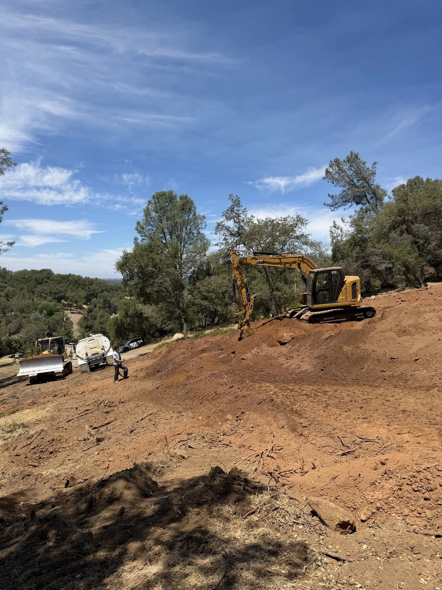 Cut-and-fill grading with heavy equipment in Newcastle, CA