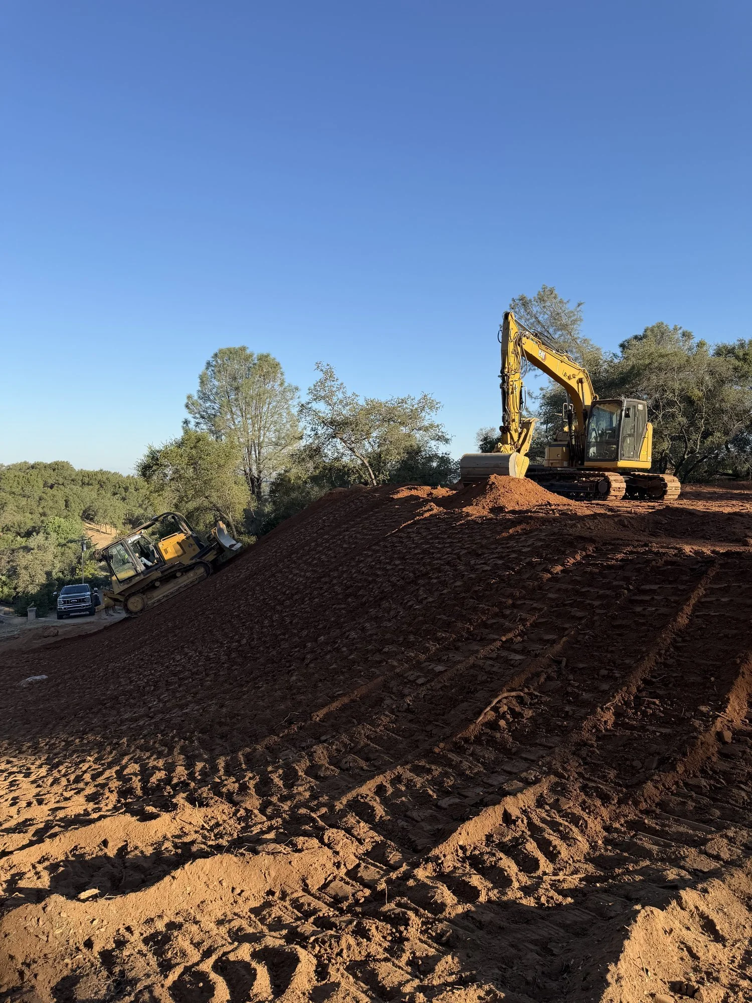 Preparing the compacted shop pad in Newcastle, CA