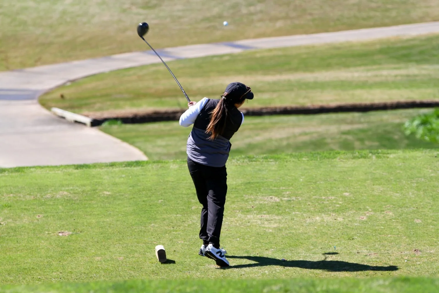 Golfer following through on a drive
