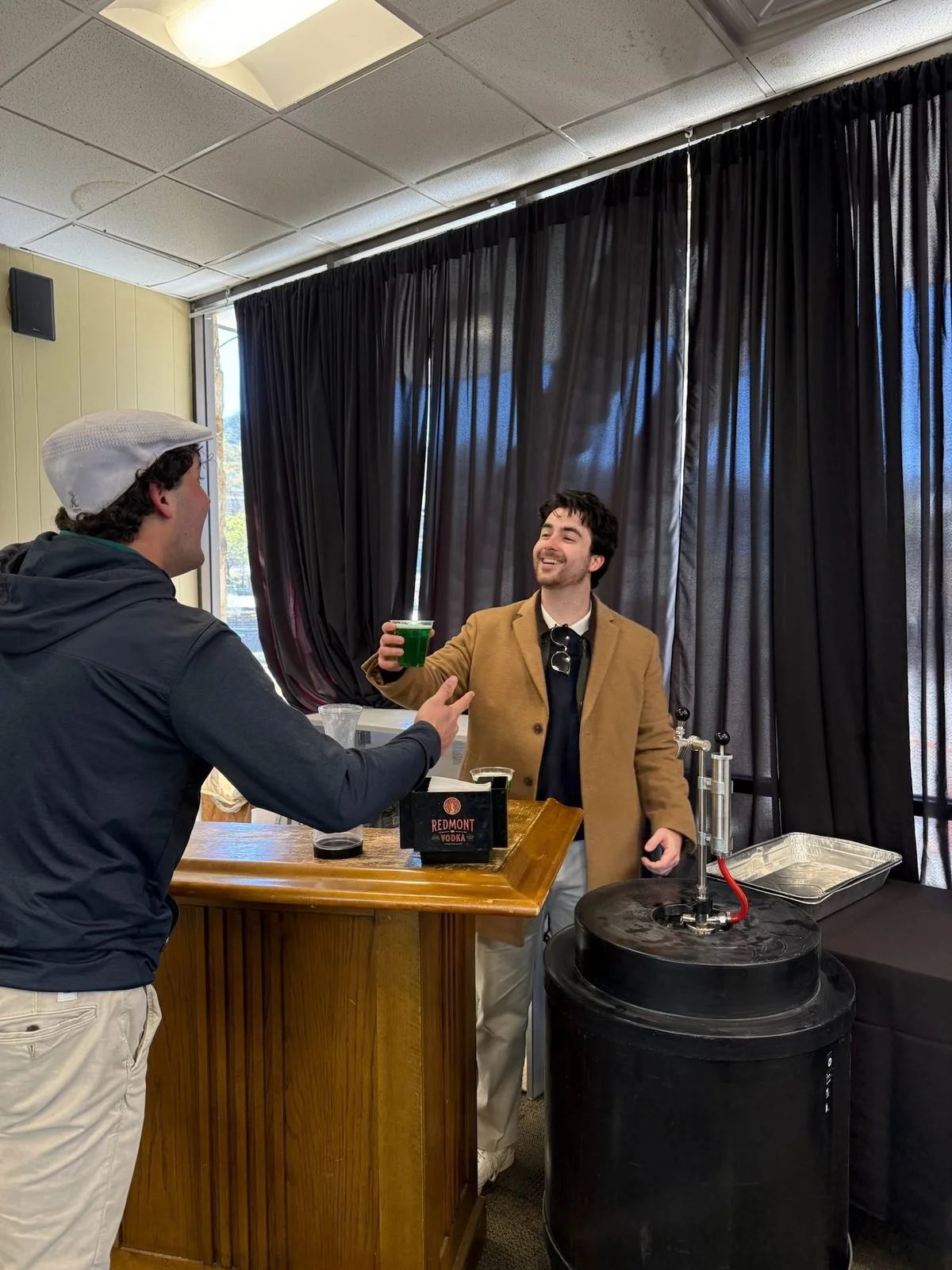 Handing out green beer at the bar