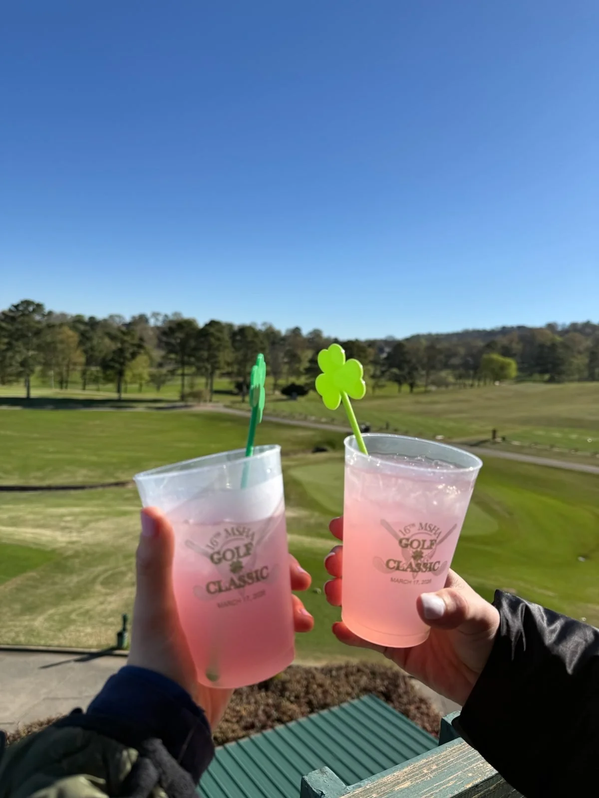 Two drinks raised over the course