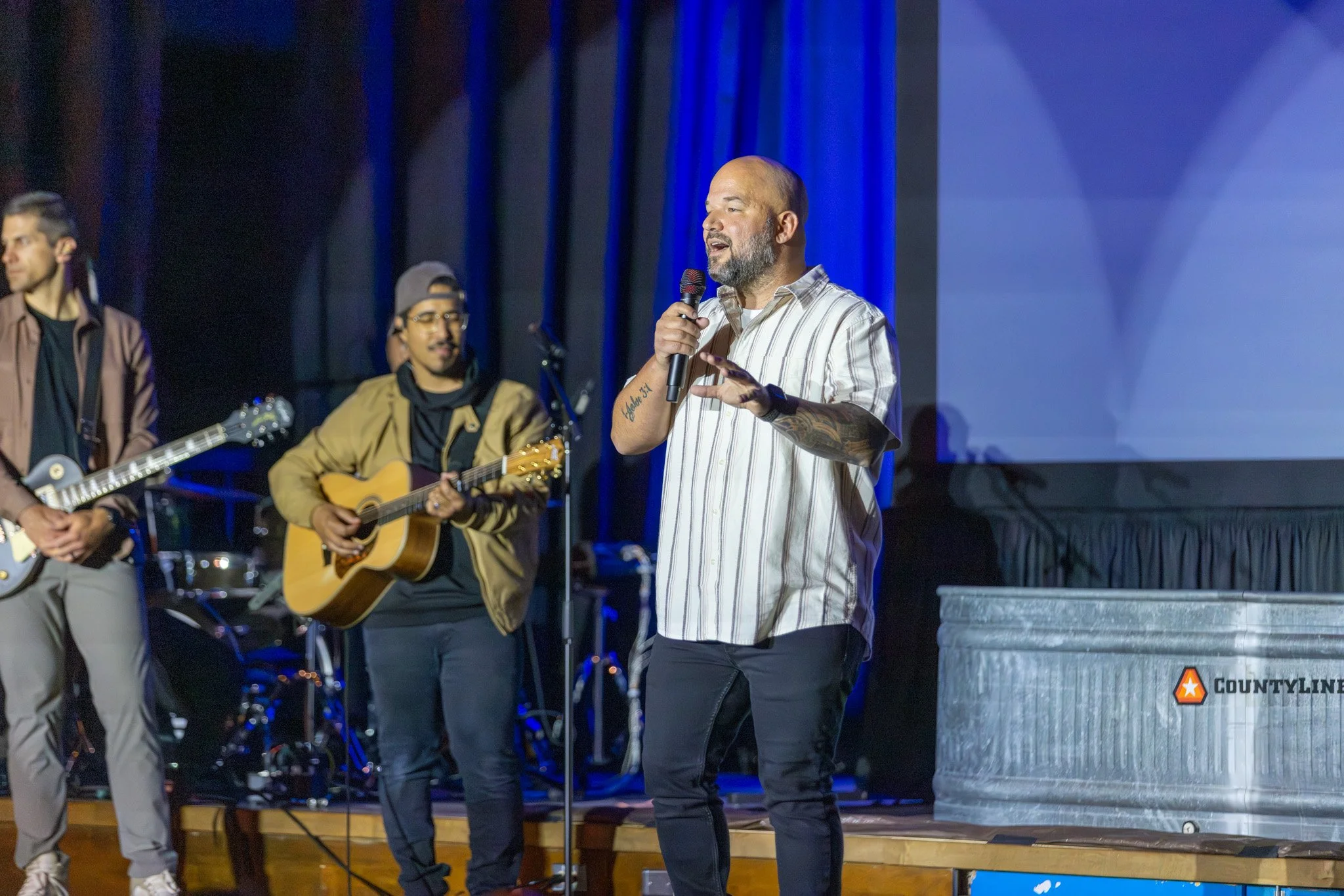 Worship service with warm stage lighting