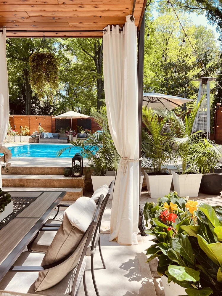 Cabana lounge overlooking the pool at Hill House