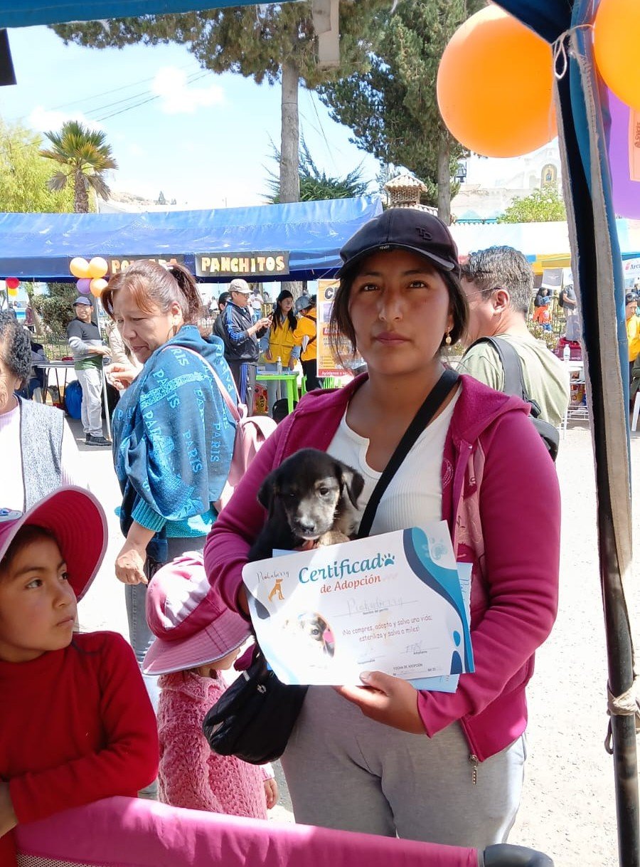 Lady adopting a puppy