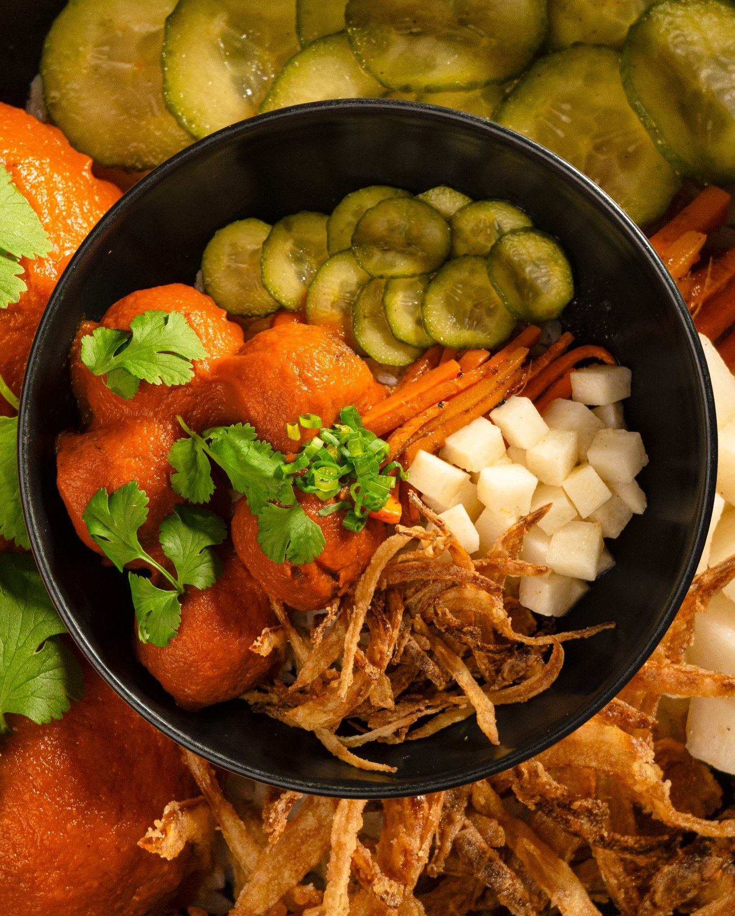 Fried bites with pickles, slaw and crisp onions at La Tapa del Coco