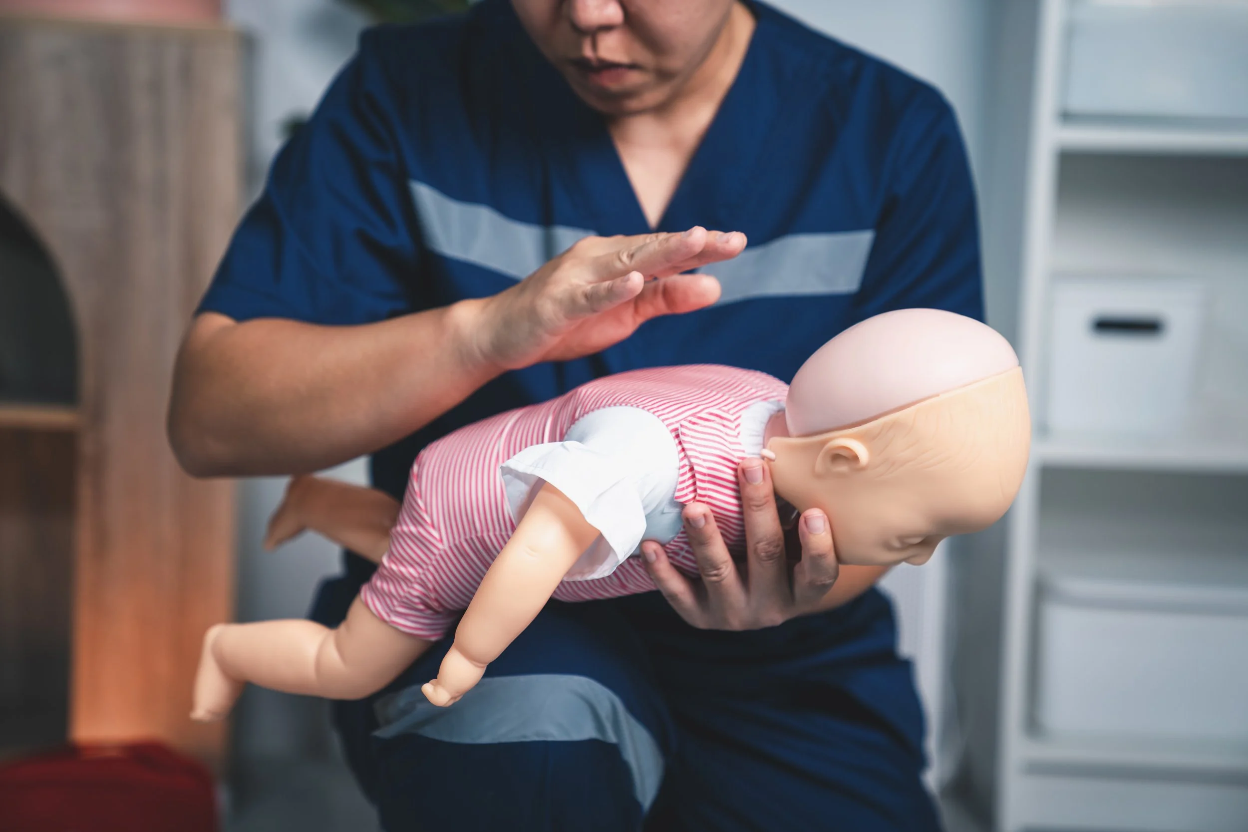 Instructor and student practicing PALS skills during class