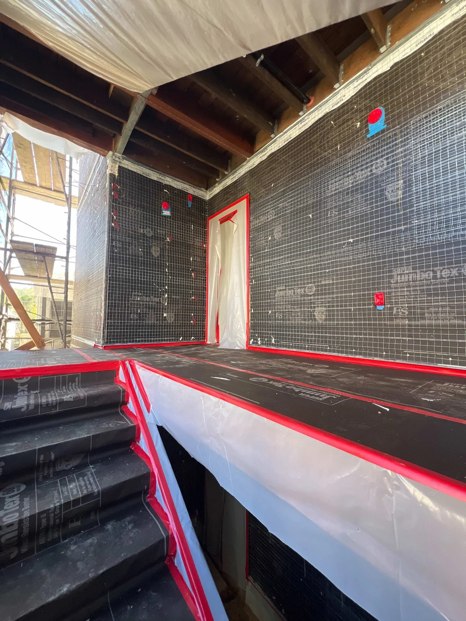 Upper landing walls lathed and ready for stucco