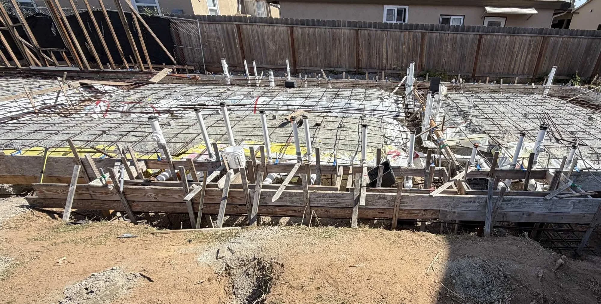 Slab rebar and underground plumbing ready for the pour