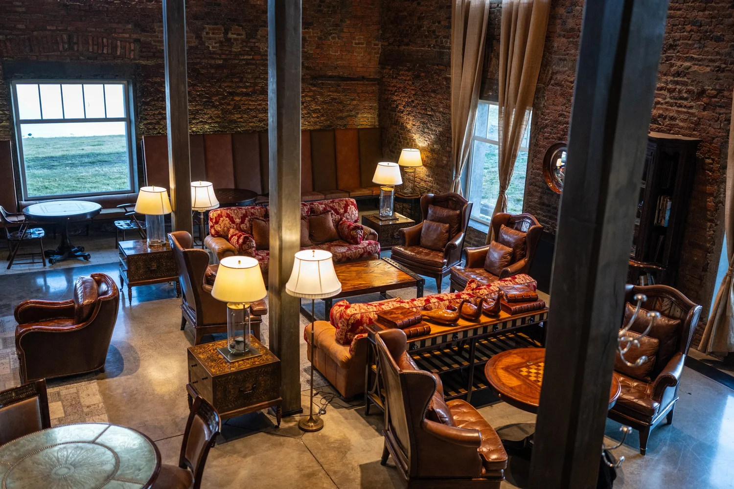 Leather armchairs and reading lamps in the lounge