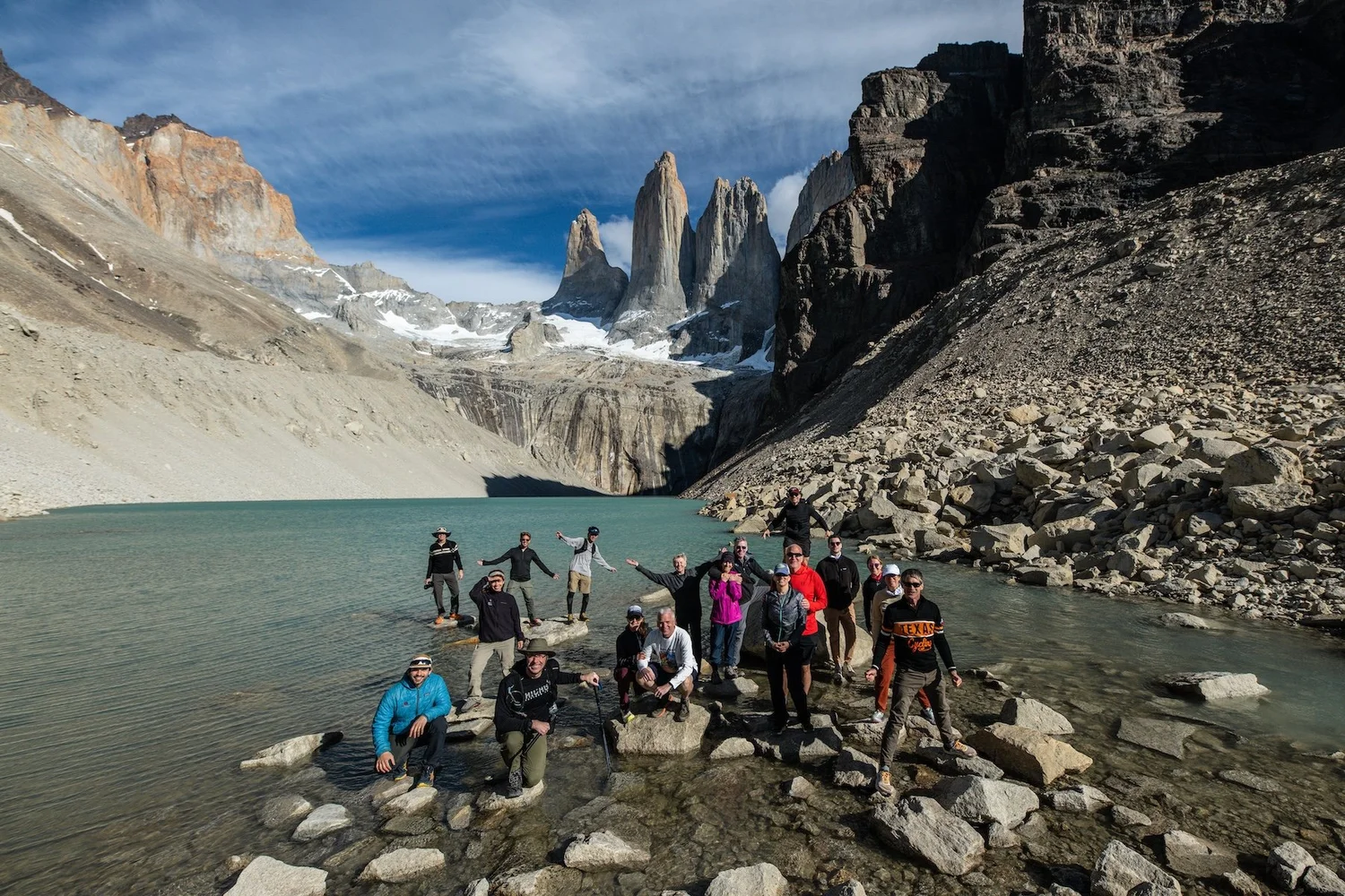 The group at the glacial lagoon beneath the three granite towers