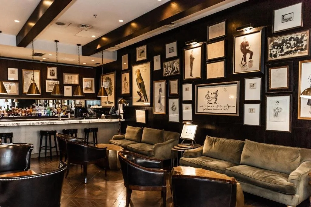 The bar, hung floor to ceiling with prints
