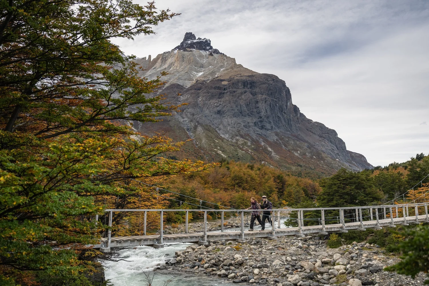 Crossing a footbridge on the way into the French Valley